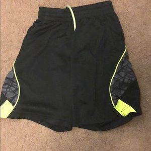 Small green and black tea gear shorts
